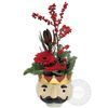 Flower arrangement in a ceramic nutcracker