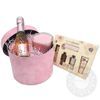 Pink box with small prosecco bottle, candle and care set