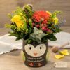 Ceramic owl with cheerful flowers