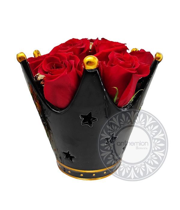 Red roses in ceramic crown