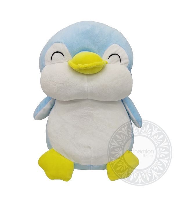 Stuffed light blue penguin
