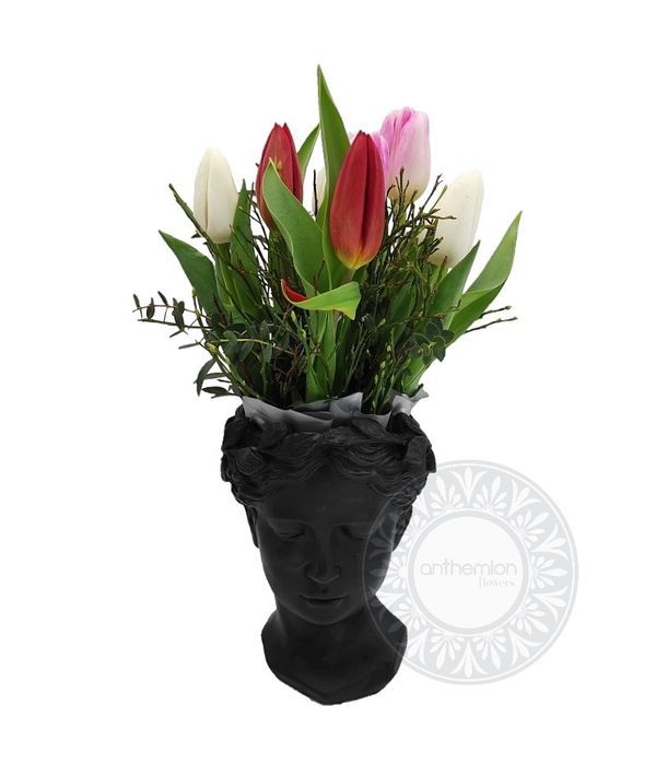 Black ceramic head with tulips