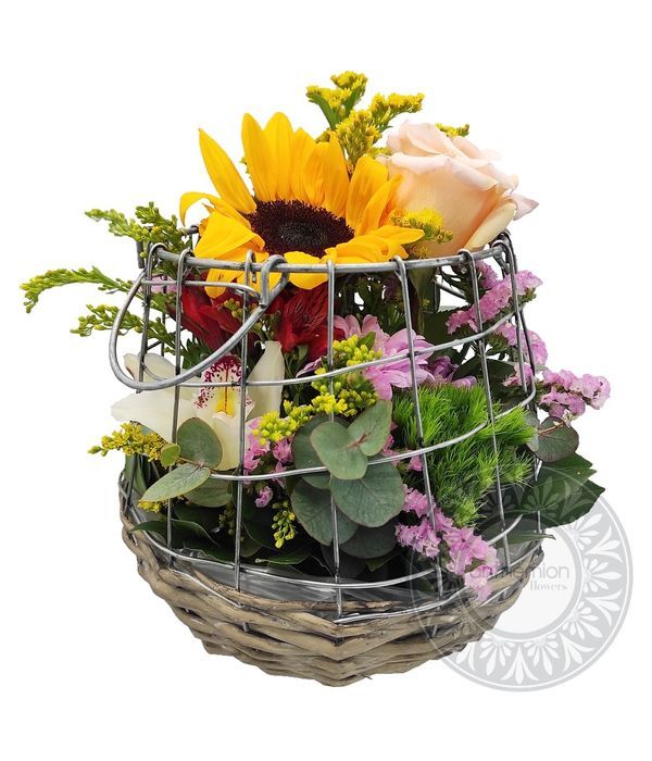 Fresh flowers in a cage style base