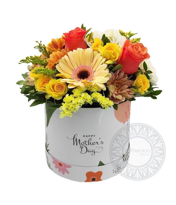 Στρογγυλό κουτί με λουλούδια για τη γιορτή της μητέρας