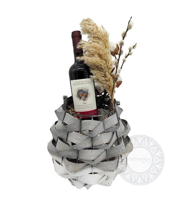 Lantern with decorations and bottle of wine