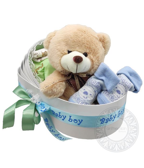 Baby bed with gifts for the little boy
