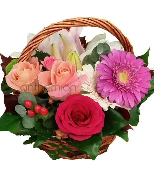 Basket with roses, gerberas and lilies