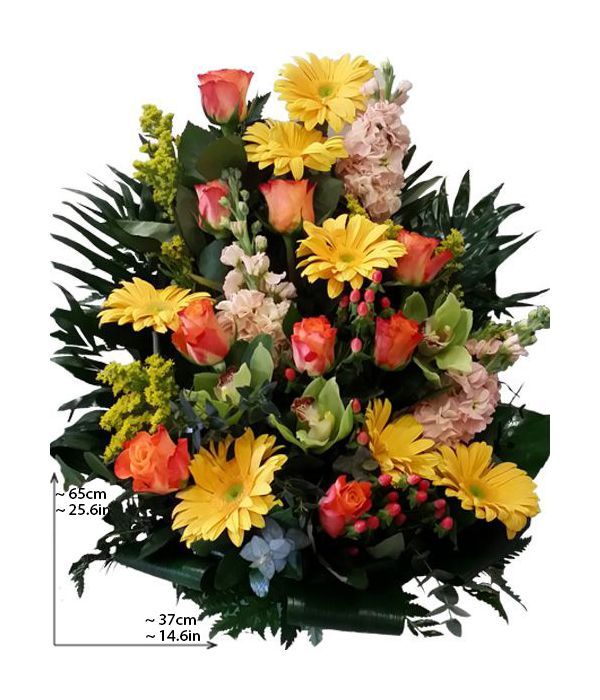 Tall arrangement with bright flowers