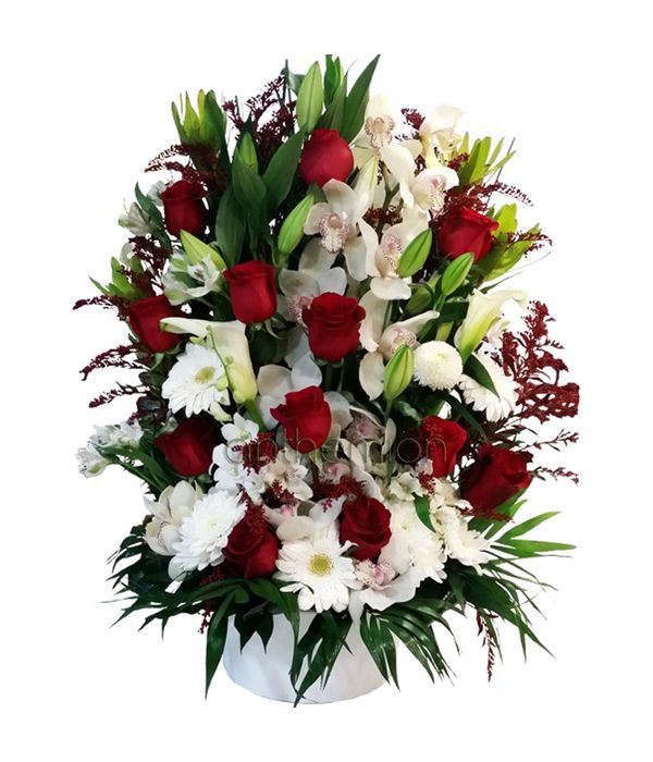 Tall arrangement with red and white flowers