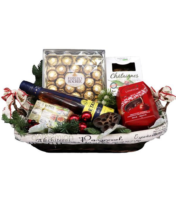 Basket with sweet delies and 5 star METAXA BRANDY
