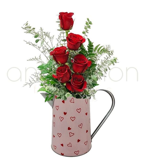 Metallic jug with roses