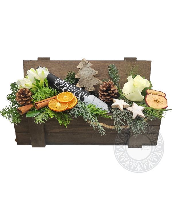 Chest with white flowers and wine
