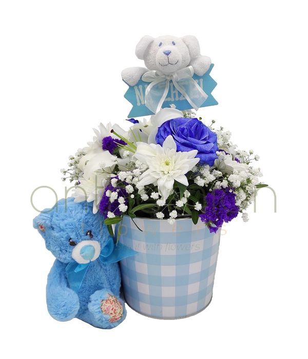 Flowers with teddy bear for baby boy