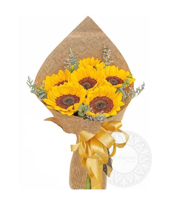 Bouquet of sunflowers in burlap