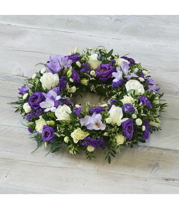 Elegant blue and white funeral wreath