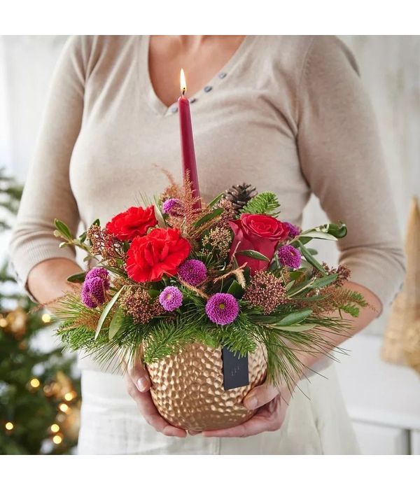 Pink Xmas arrangement with candle