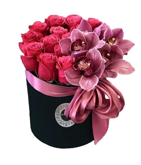Black box with fuchsia roses and orchids
