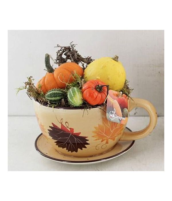 Ceramic mug with autumn fruits