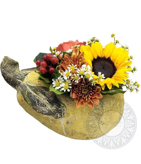 Ceramic pear with seasonal flowers