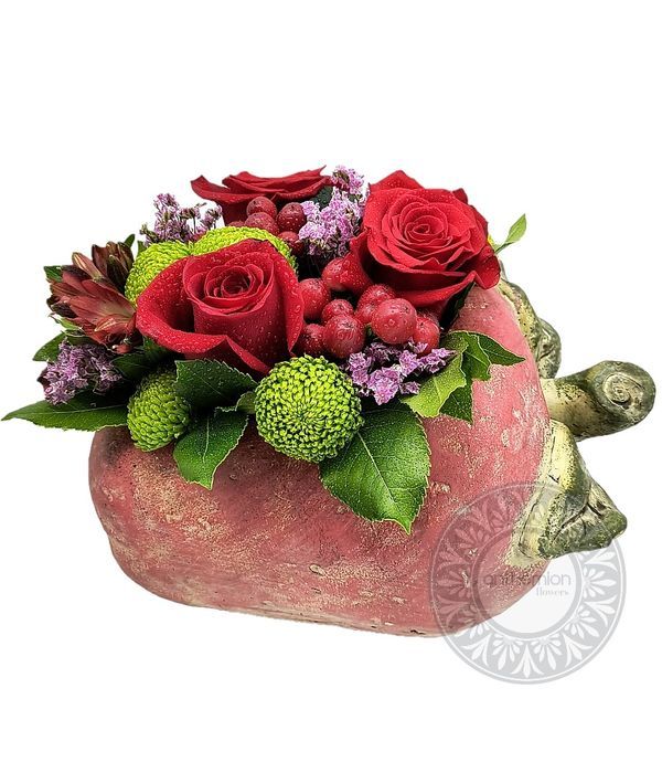 Ceramic strawberry with flower arrangement