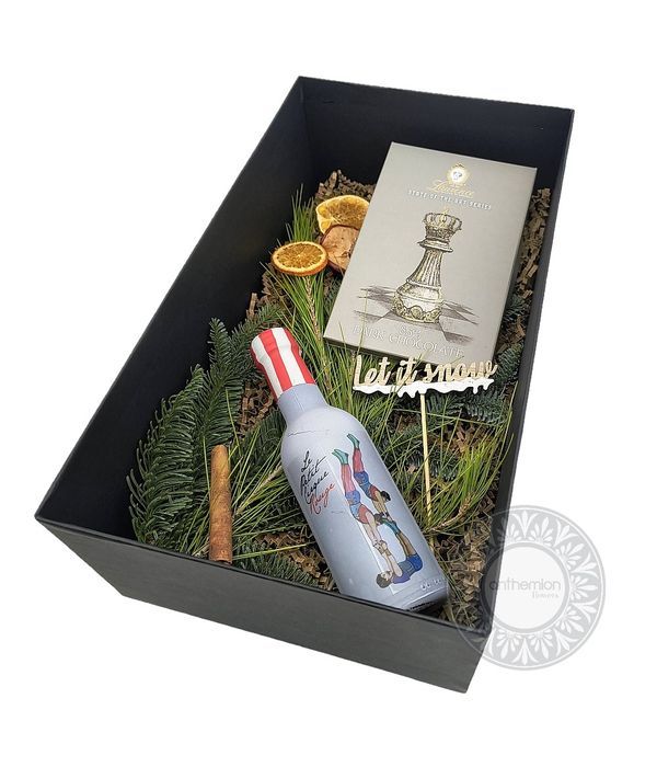 Christmas box with a bottle of wine and chocolate