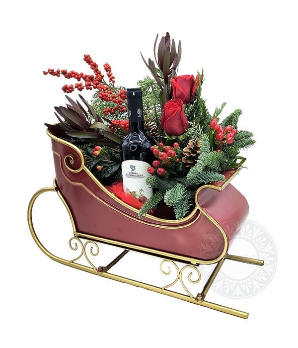 Έλκηθρο με σύνθεση λουλουδιών και κρασί