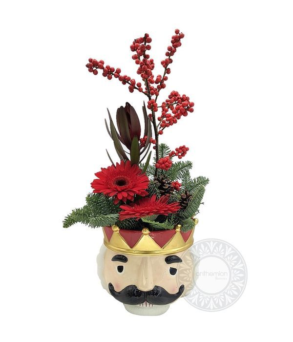 Flower arrangement in a ceramic nutcracker