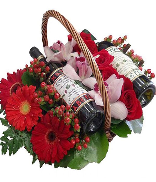 Flowers and two wines in a Basket