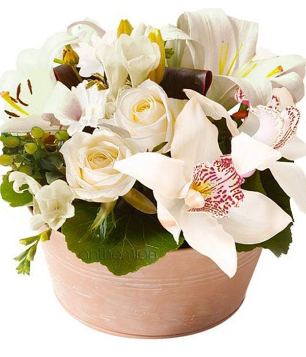 Arrangement with white orchids and lilies