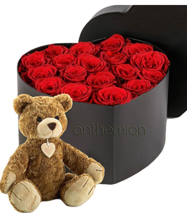 Gift box with red roses and teddy bear