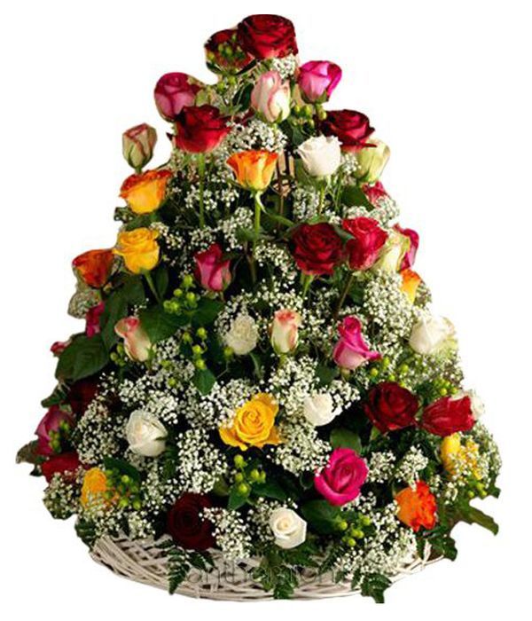 Arrangement in basket with colorful roses