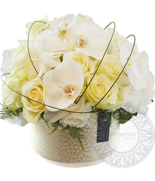 Elegant rose and orchid flower arrangement