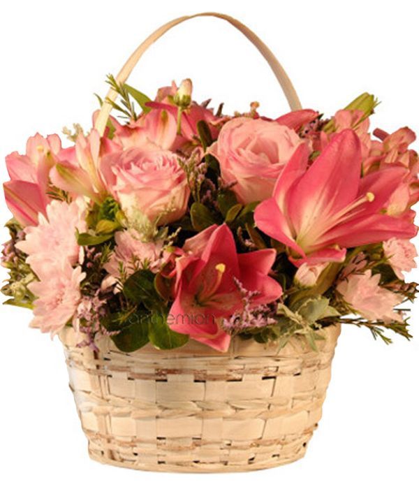 Basket with flowers in soft colors 