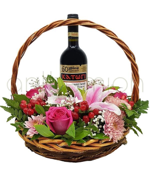 Beautiful arrangement with roses and wine