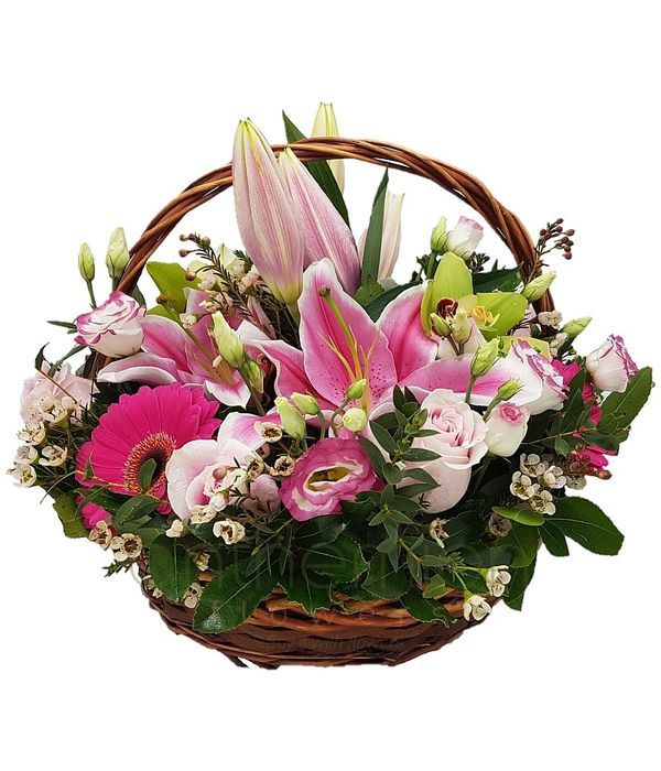 Roses, orchids and lilies in basket 