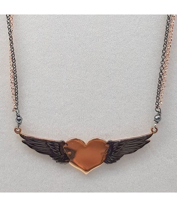 Jewelry heart with feathers
