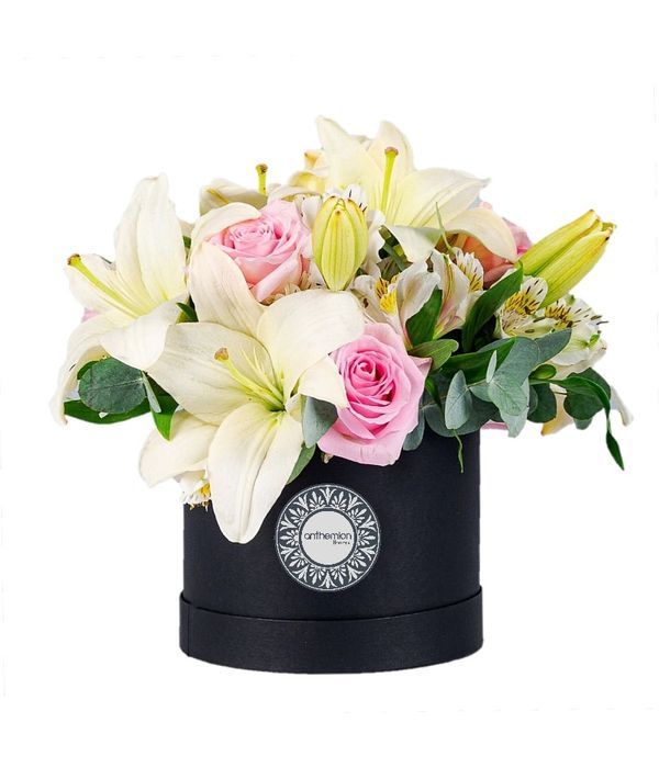 Gorgeous flowers in black round box 