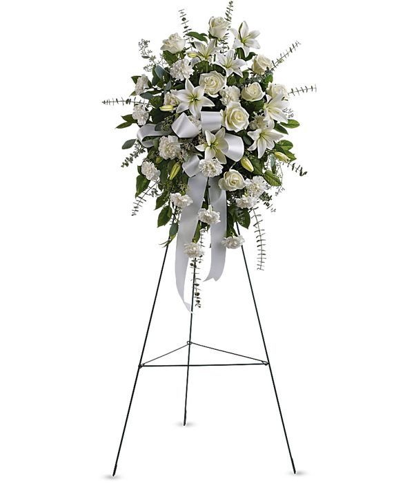 Λευκή κομψή σύνθεση κηδείας σε τρίποδο