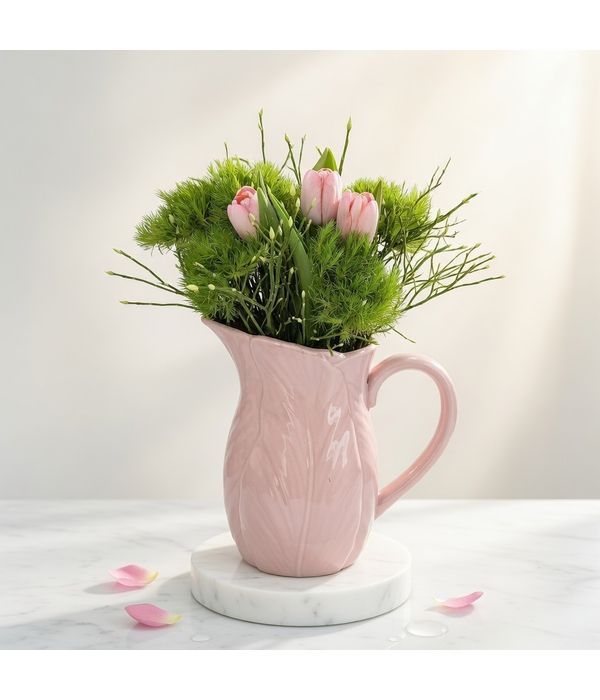 Tulips and chrysanthemums in a ceramic jug