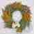 Handmade wreath with yellow details