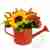 Ποτιστήρι με λουλούδια σε ζεστά χρώματα