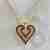 Heart pendant with fuchsia gems
