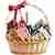 Basket with sweet treats and wine